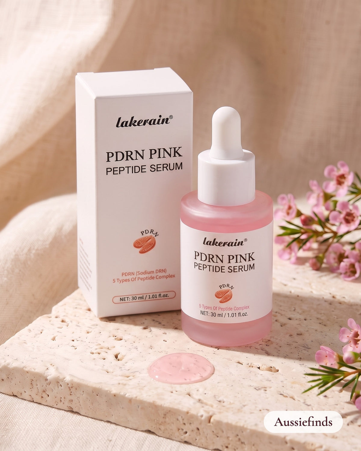 Lakerain PDRN Pink Peptide Serum 30ml with salmon DNA PDRN, bottle and box on travertine