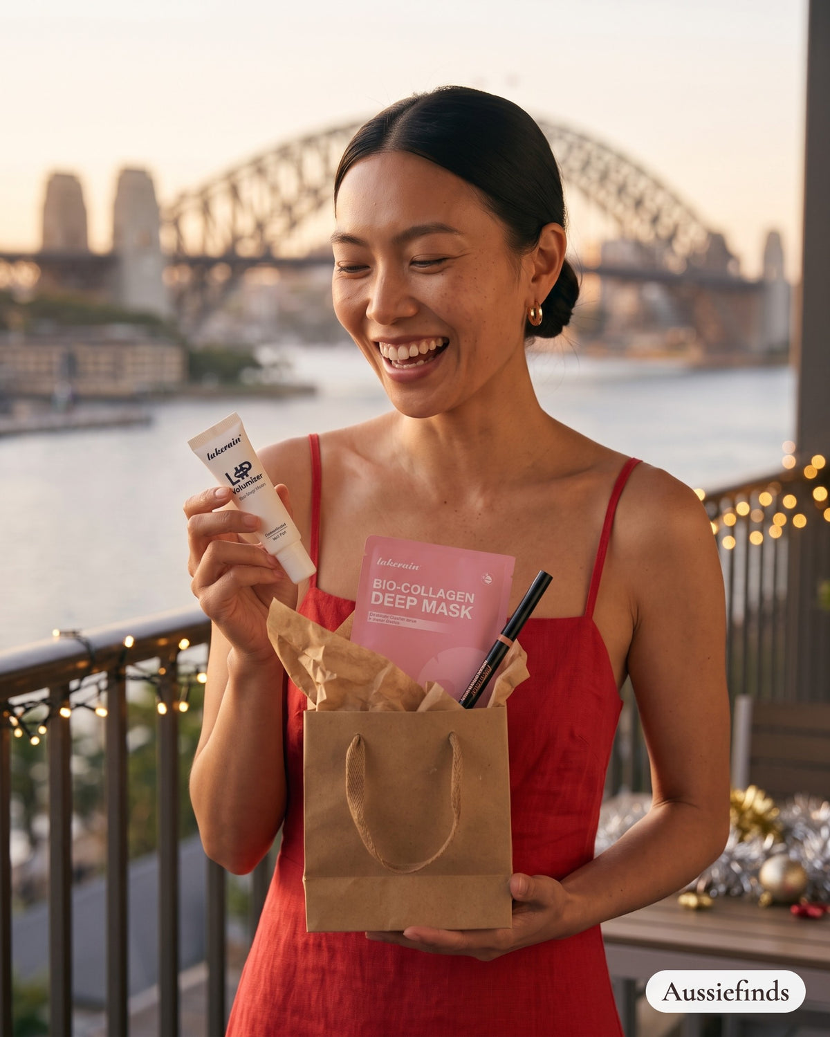 Model unwrapping the Mini Glow Trio on a Sydney harbour balcony